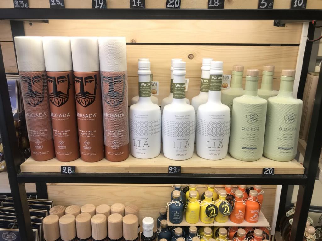 Detail of a shop in Athens where the extra virgin olive oil of one of ARTOLIO's beneficiaries is sold.